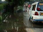 Jalan Pajajaran tergenang air luapan dari Danau Sasak.