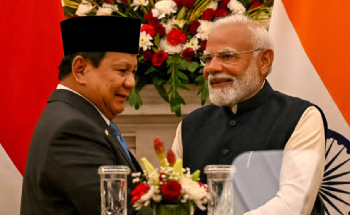 makna strategis kunjungan modi ke indonesia bagi asia